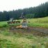 Teichentschlammung bei Kuensdorf mit Raupe, Bagger und Traktor
